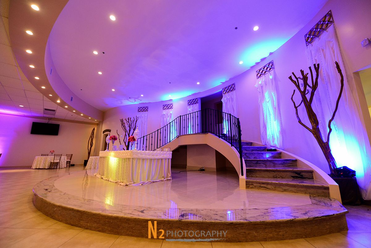 Stage with curved staircase at La Fontaine Original Venue