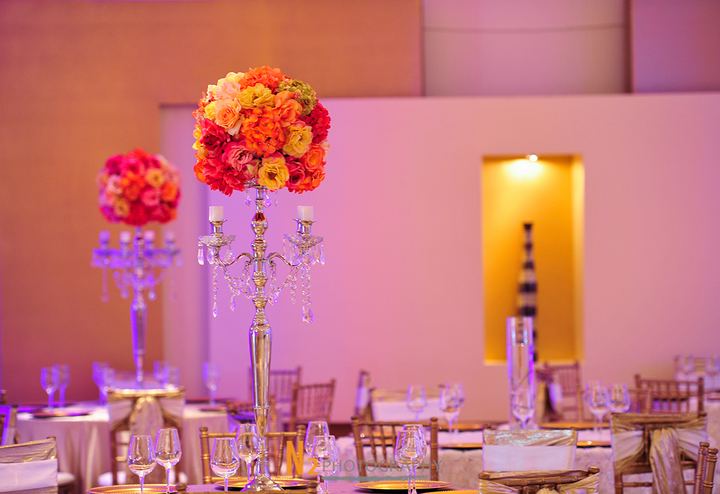 Tall floral centerpieces at La Fontaine Original Venue